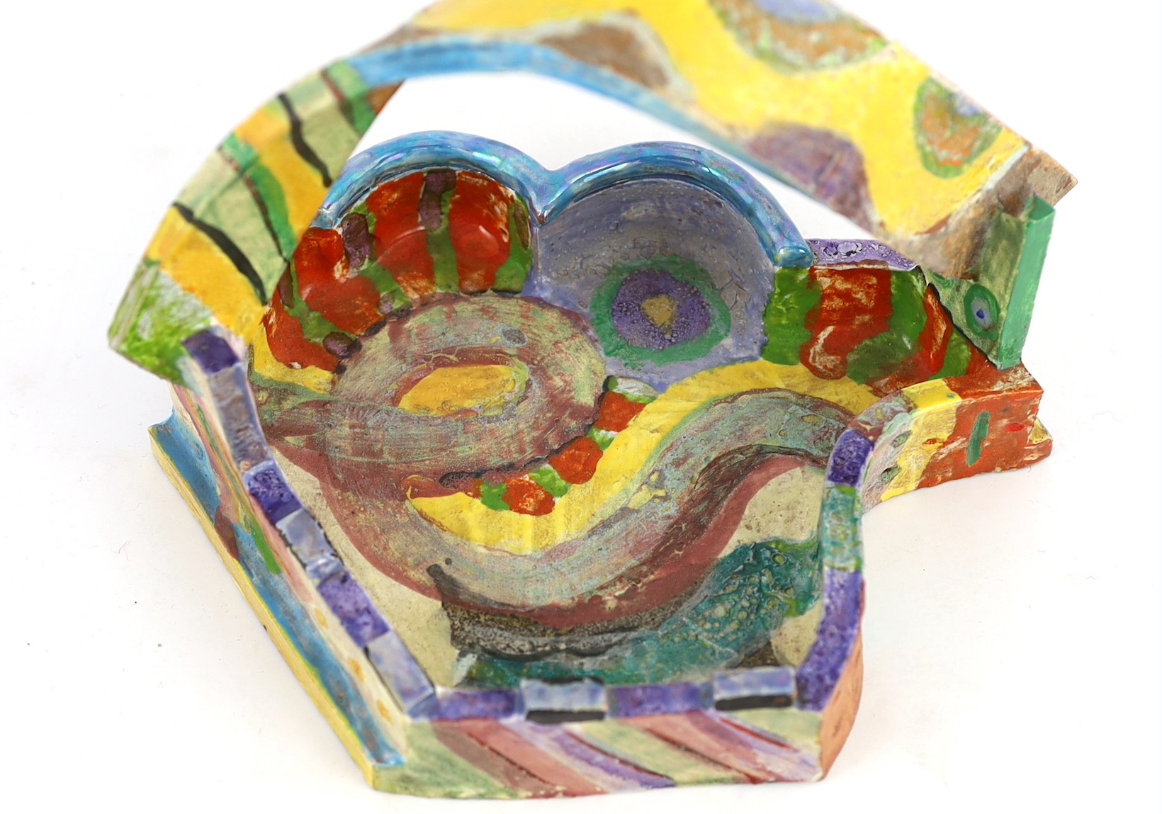 Angus Suttie (1946-1993), a multicoloured glazed stoneware dish or basket, 21.6cm wide 16.5cm high